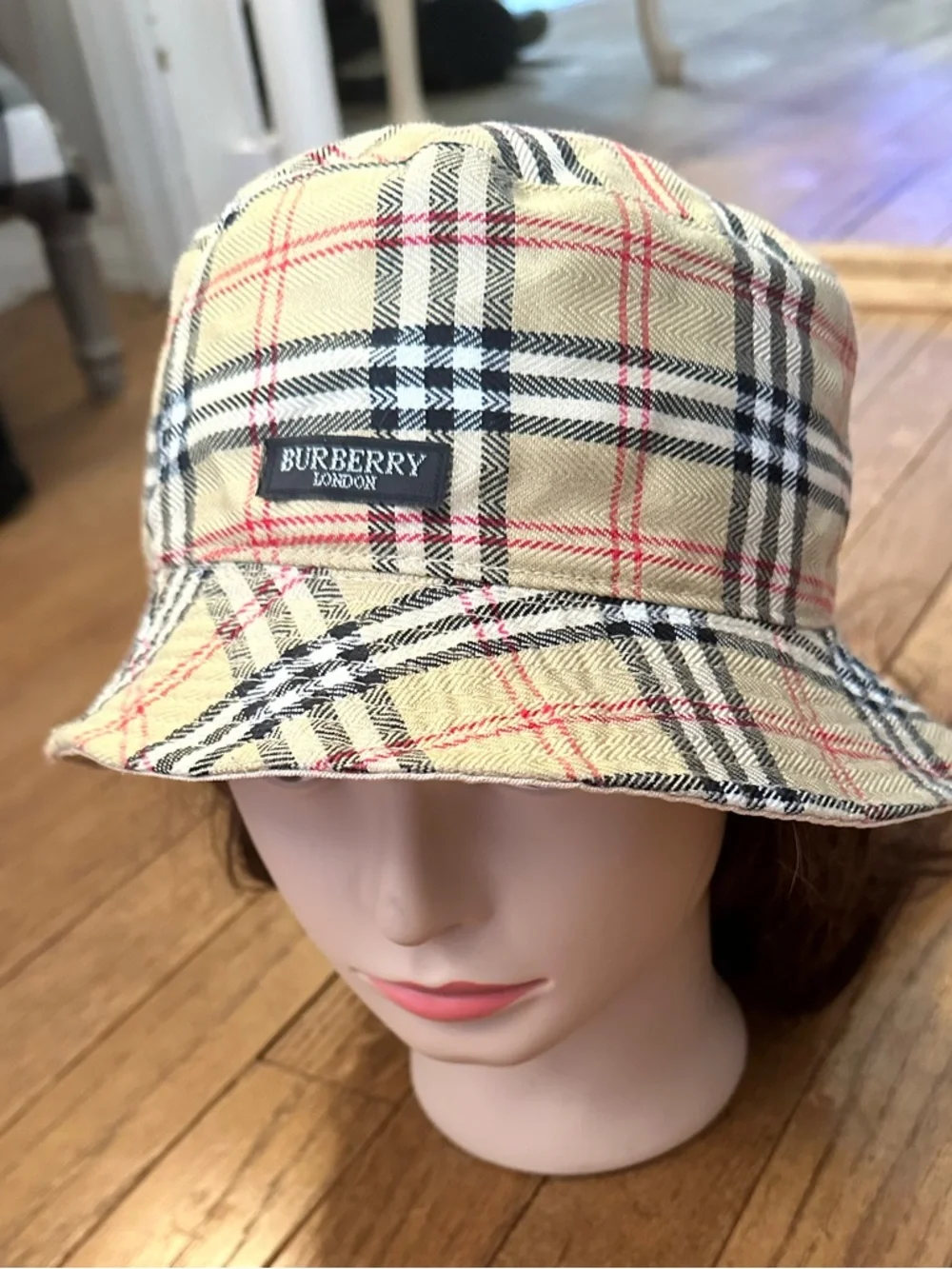Burberry Beige Plaid Bucket Hat with Black & Red Accents